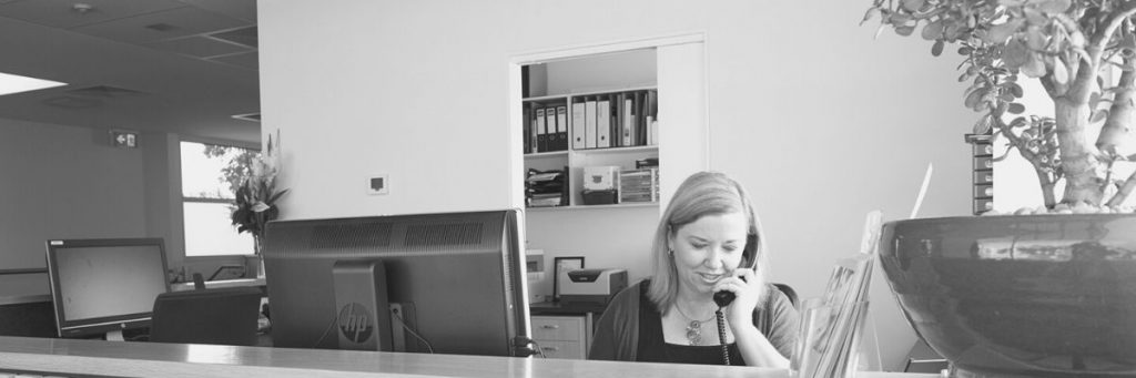 Woman at work in office setting: Returning to work after maternity leave